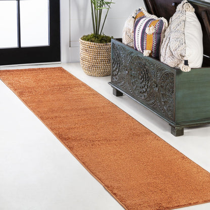 JONATHAN Y Tumbling Solid Low-Pile Area Rug