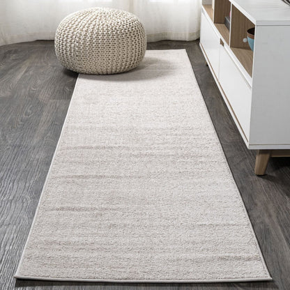 JONATHAN Y Tumbling Solid Low-Pile Area Rug