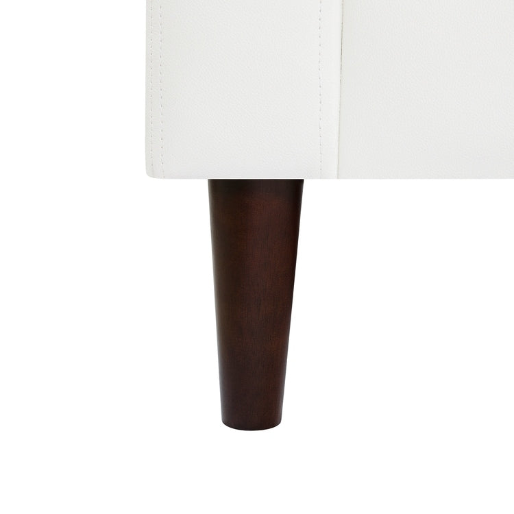 Canapé moderne en cuir véritable avec pieds en bois et coussin supplémentaire.