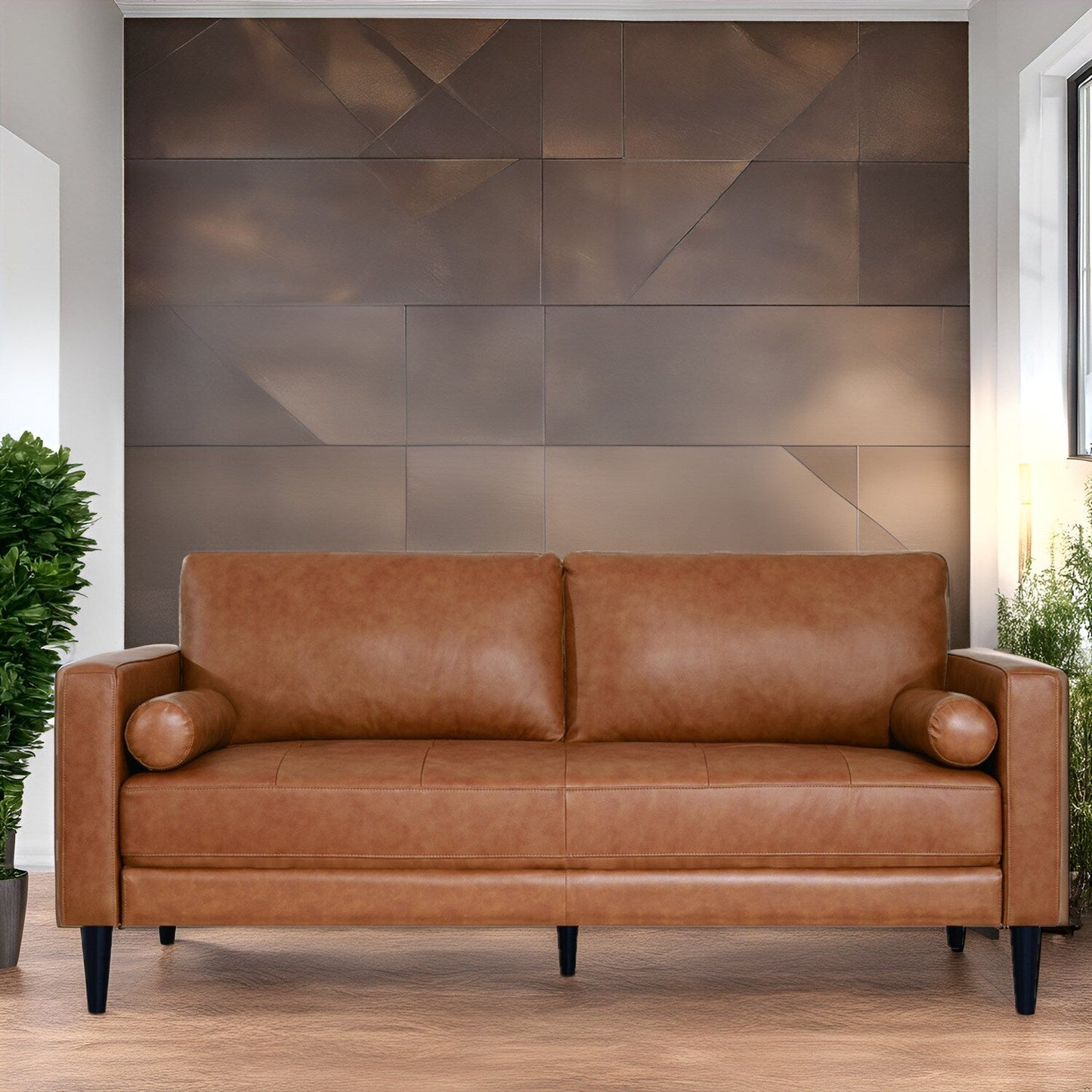 Canapé moderne en cuir véritable avec pieds en bois et coussin supplémentaire.