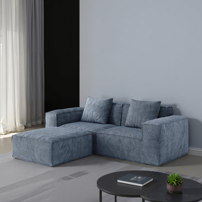 Canapé-lit convertible modulable 2 places en velours côtelé gris.