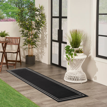 Nourison Essentials Indoor/Outdoor Solid Area Rug