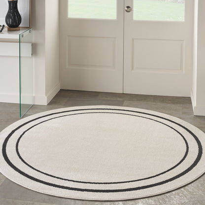 Nourison Essentials Indoor/Outdoor Solid Area Rug