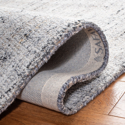 SAFAVIEH Handmade Abstract Coraly Modern Viscose Rug