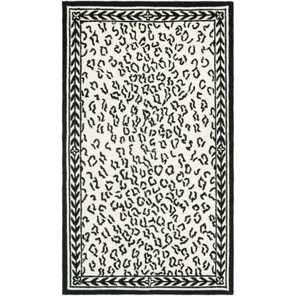 SAFAVIEH Handmade Chelsea Solar Garden Leopard French Country Wool Rug