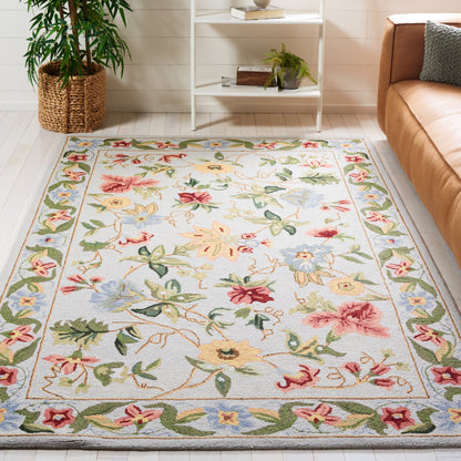 SAFAVIEH Handmade Chelsea Yauhenia French Country Floral Wool Rug