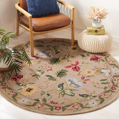 SAFAVIEH Handmade Chelsea Yauhenia French Country Floral Wool Rug