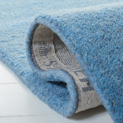 SAFAVIEH Handmade Himalaya Colorweave Plaid Modern Wool Rug