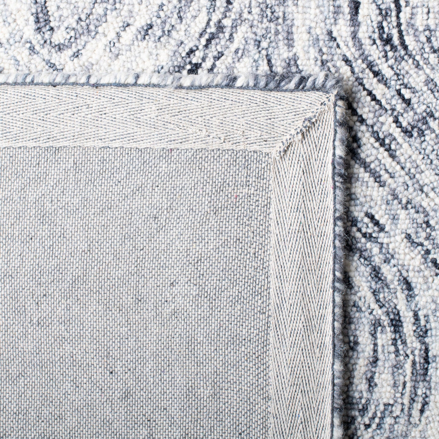 SAFAVIEH Handmade Ikat Lilija Wool Rug