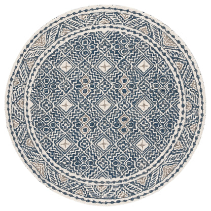 SAFAVIEH Handmade Micro-Loop Lutetia Wool Rug