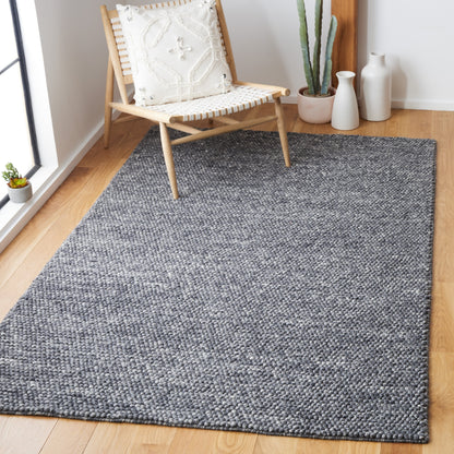 SAFAVIEH Handmade Natura Gonnie Wool Rug