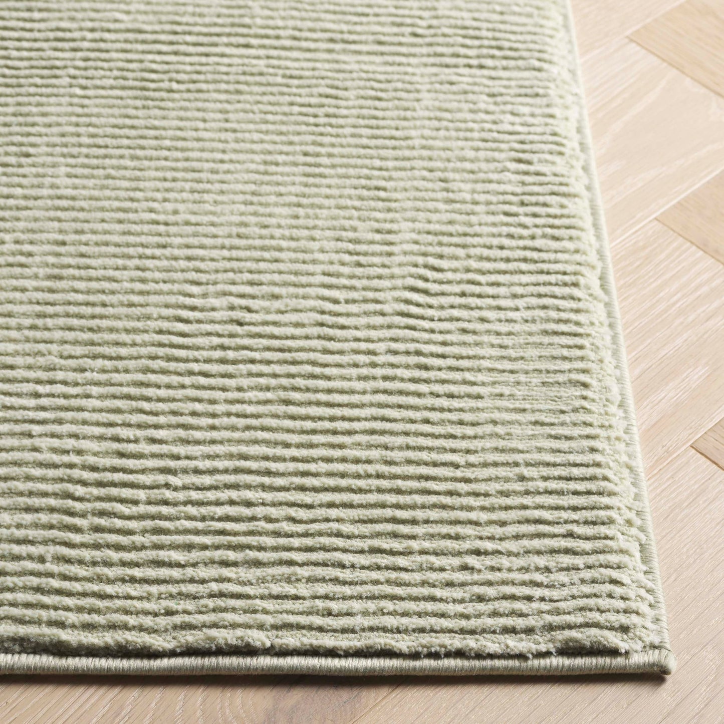 SAFAVIEH Revive Avie Solid Rug