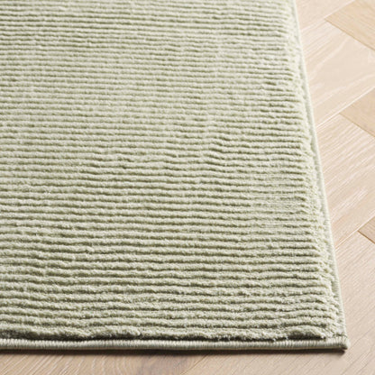 SAFAVIEH Revive Avie Solid Rug