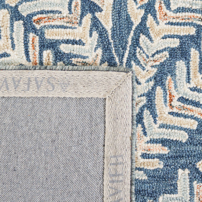 SAFAVIEH Handmade Capri Kert Wool Rug