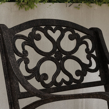 Ensemble de repas d'extérieur Sanibel en aluminium bronze, 7 pièces, comprenant une table ovale de 72 pouces et six chaises à accoudoirs de la marque Homestyles.