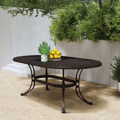 Ensemble de repas d'extérieur Sanibel en aluminium bronze, 7 pièces, comprenant une table ovale de 72 pouces et six chaises à accoudoirs de la marque Homestyles.