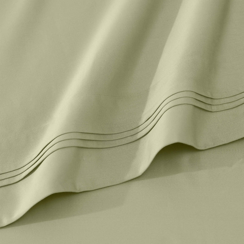 Jeu de draps uni en coton égyptien supérieur, 1000 fils, avec profonde poche.