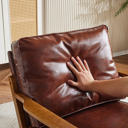 Fauteuil d'appoint en tissu mélangé de lin avec pieds en bois et un coussin beige.